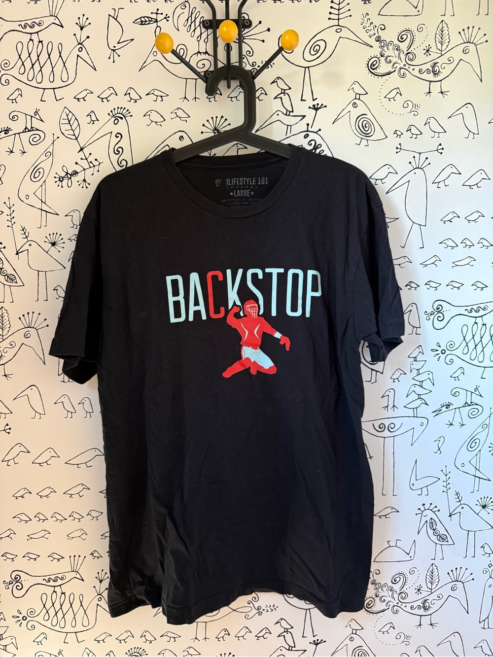 Men’s Black BACKSTOP Graphic Tee